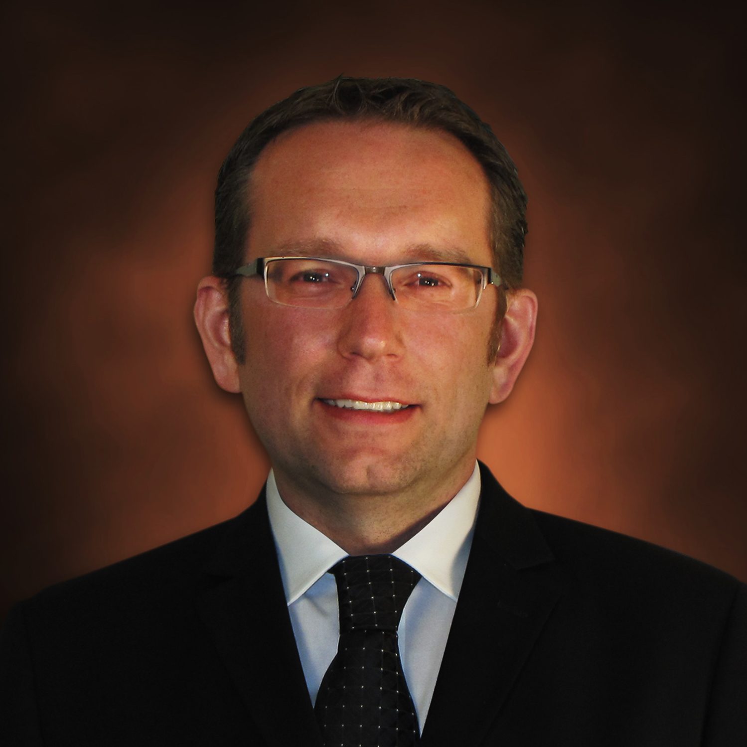 Headshot of Timm Boettcher, president and CEO of RW Thrive